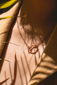 gold interlocking eternity infinity necklace charm 18k circles charm