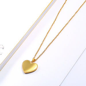 gold locklet heart necklace  jewelry on gold chain